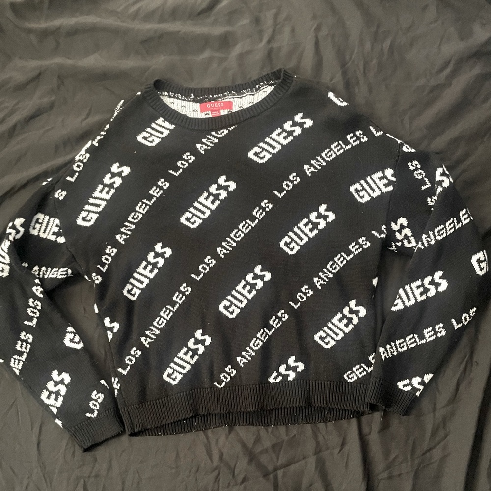 GUESS logo sweater size Medium.  super cute and trendy send me an offer.